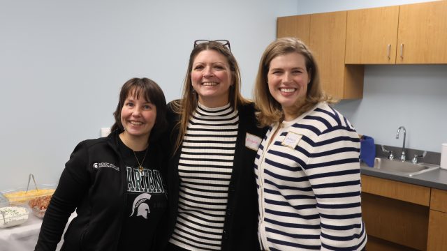 Three IMPART Training team members at the AAAWM's Community Lab Launch