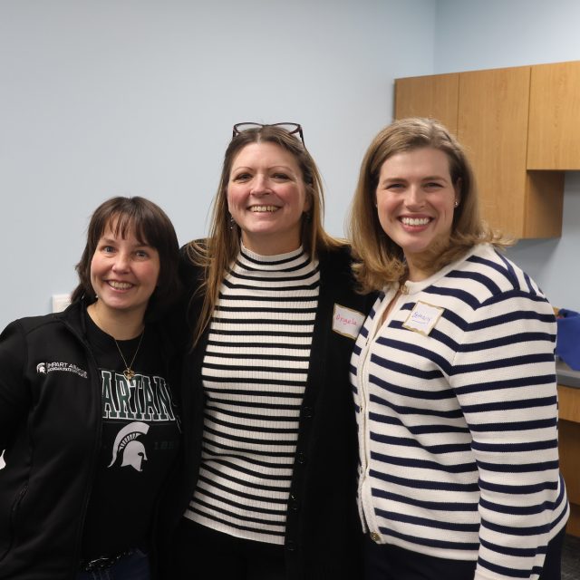 Three IMPART Training team members at the AAAWM's Community Lab Launch